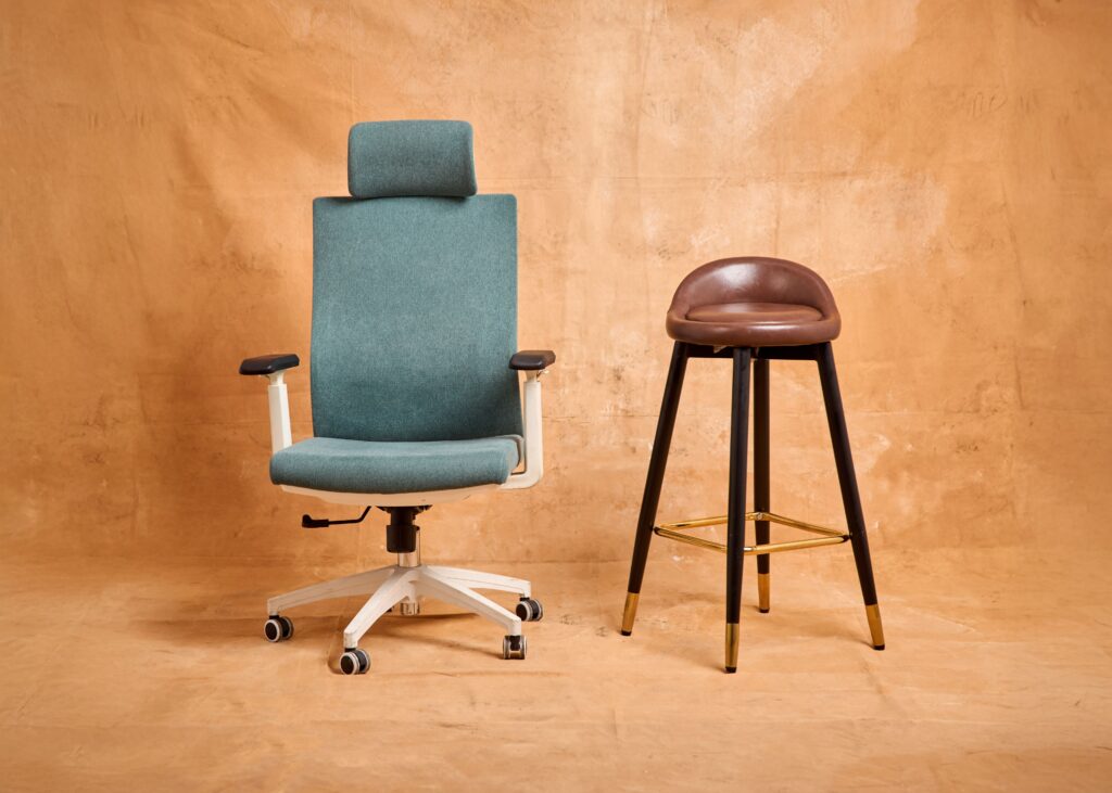 Best Ergonomic Office Chairs for Long Hours Stylish modern office chair and bar stool on a beige textured background, perfect for furniture design concepts.
