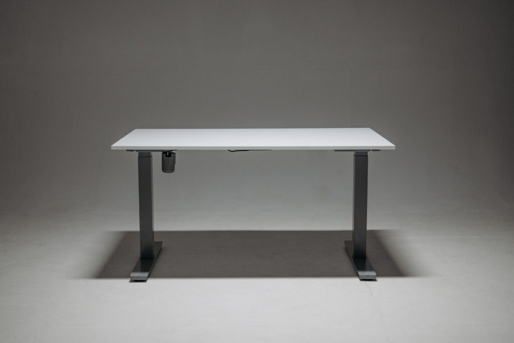 The Exact Desk Height for Typing Comfort Sleek adjustable height standing desk with a single motor for ergonomic office solutions.